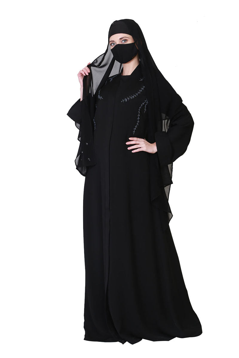Front Open Abaya With Handwork Embellishments And A Matching Hijab.
