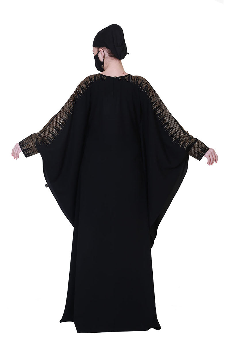 Beautiful Black Kaftan Abaya With Golden Stonework And A Matching Hijab.
