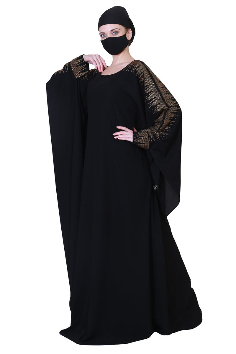 Beautiful Black Kaftan Abaya With Golden Stonework And A Matching Hijab.