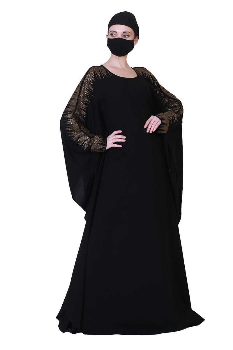 Beautiful Black Kaftan Abaya With Golden Stonework And A Matching Hijab.