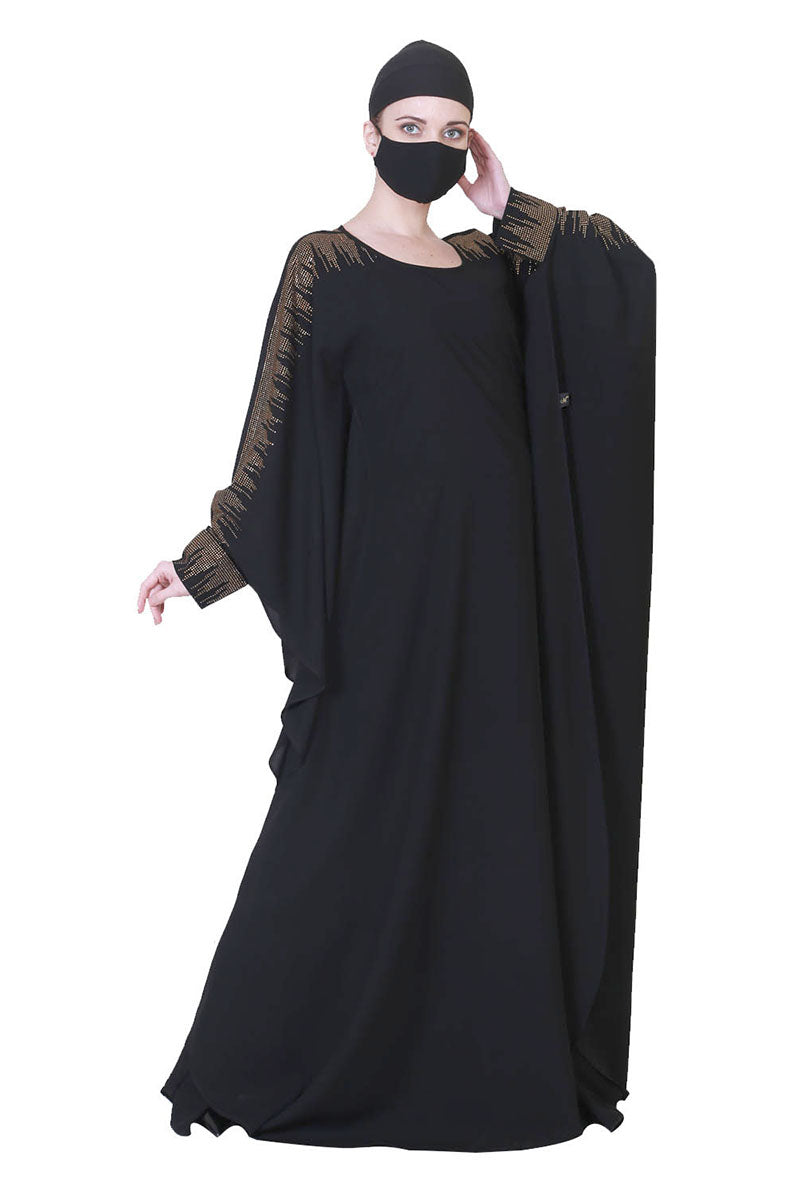Beautiful Black Kaftan Abaya With Golden Stonework And A Matching Hijab.