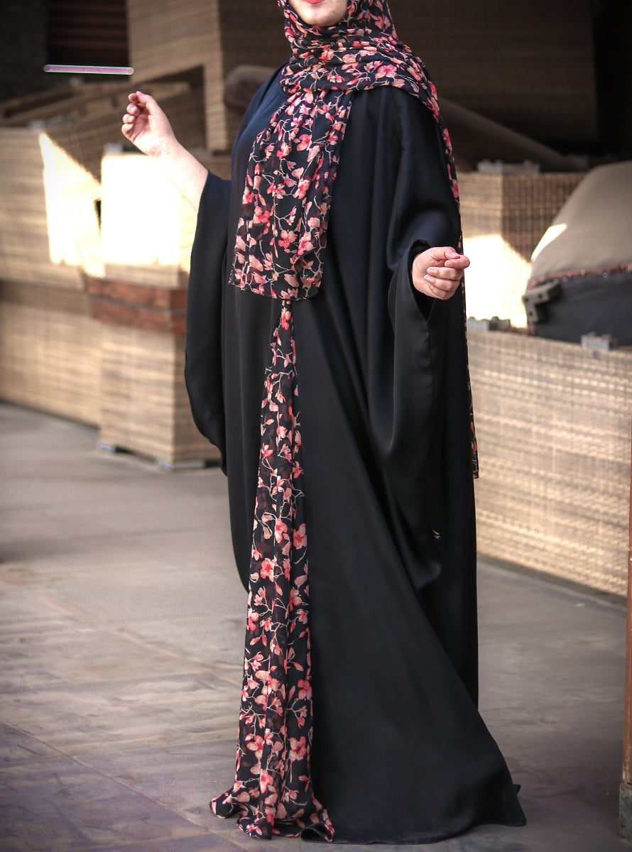 Elegant Black Kaftan With A Printed Panel Inserted Within.