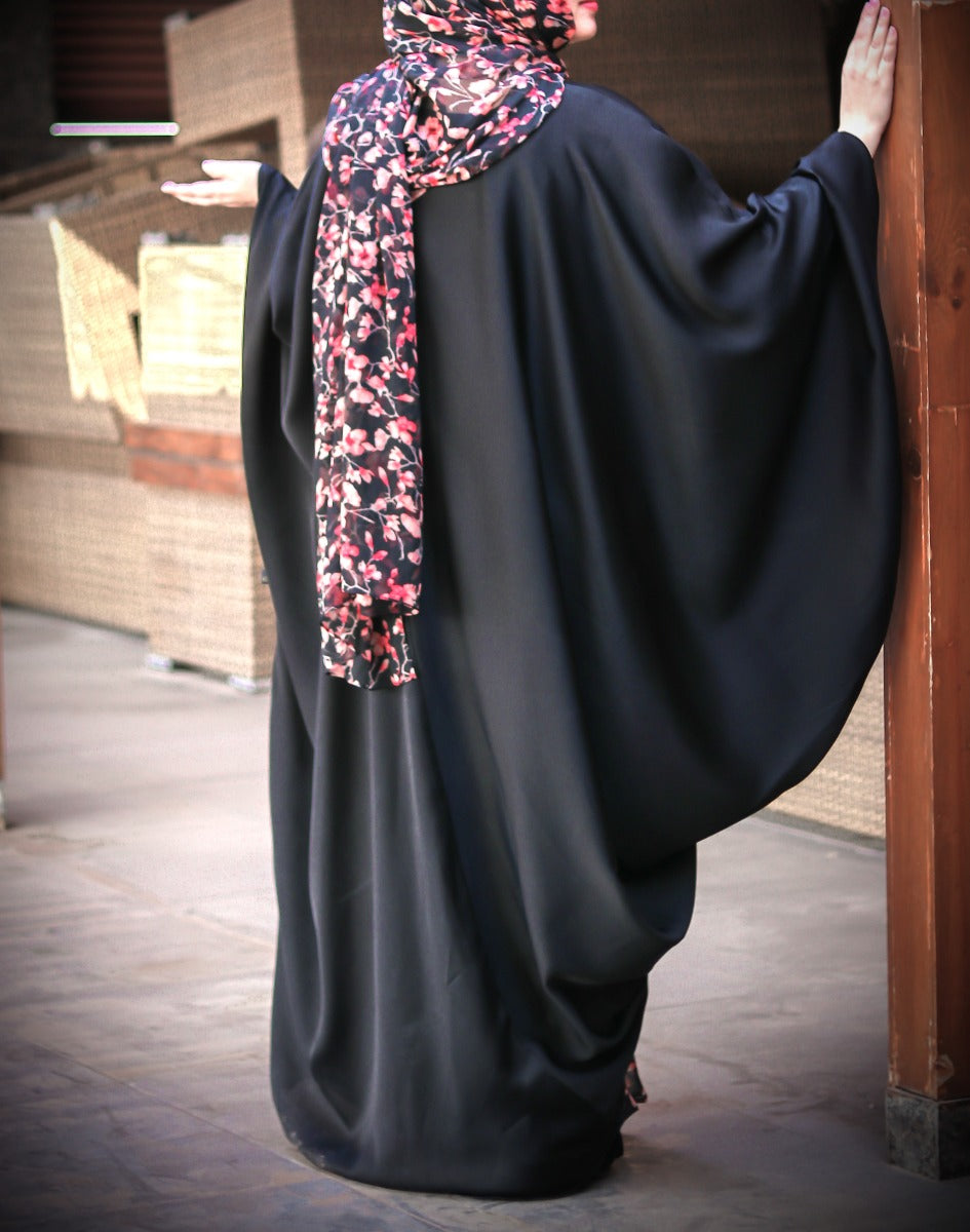 Elegant Black Kaftan With A Printed Panel Inserted Within.