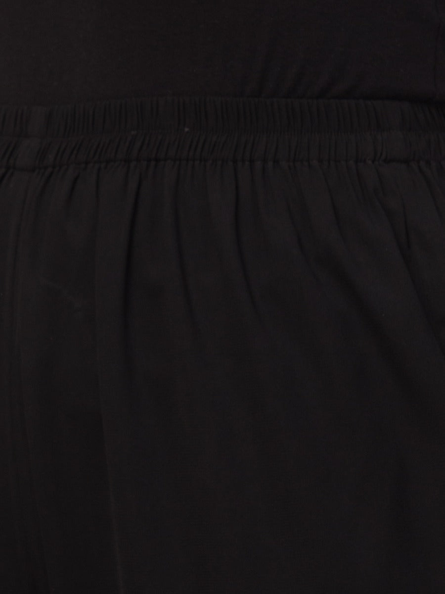 Black solid, high-rise trouser.