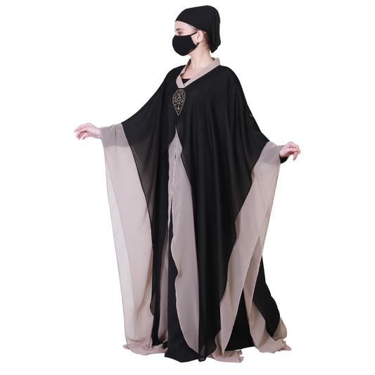 Three Pieces Set Of An Inner Abaya, A Dual Layered Cape Like Shrug And A Matching Hijab