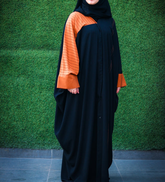 Front Open Abaya Like Kaftan With  Premium Stone Embellishments. It Comes With A Matching Hijab.