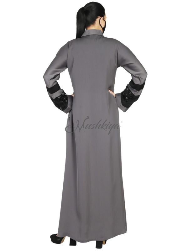 Front Open Abaya With Handwork Embellishments. It Comes With A Matching Hijab.