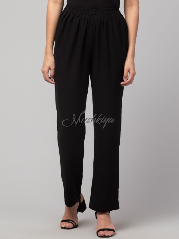 Black solid, high-rise trouser.